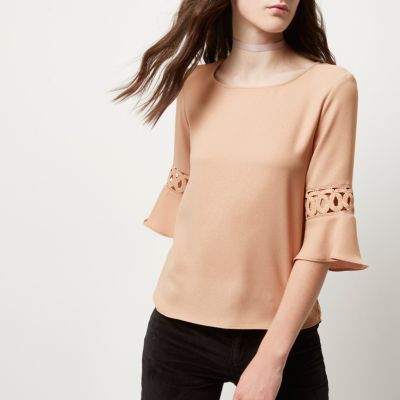 Nude cord insert bell sleeve top